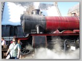 Susan in front of the Hogwarts Express